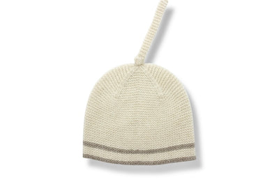 “Cream beige Mongolian cashmere baby beanie with top knot and soft knit texture, two-tone design, warm and hypoallergenic”