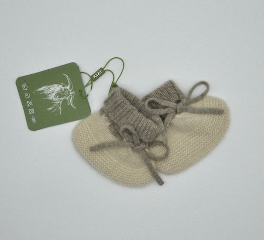 “Two-tone Mongolian cashmere baby booties with tie design, soft knit texture in beige and light brown, gentle and hypoallergenic”