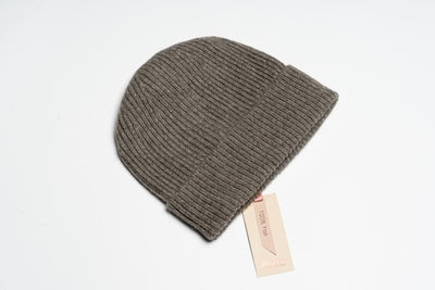 Brown 100% yak wool ribbed beanie with soft texture and minimalist design, showcasing natural warmth and sustainable craftsmanship.