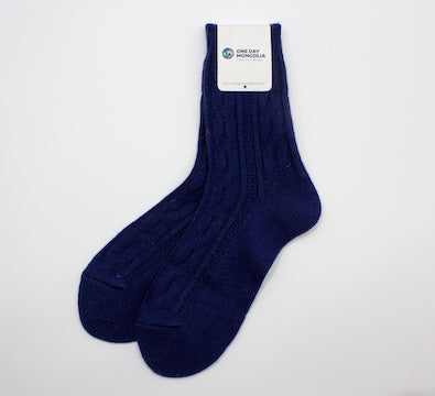 “Dark blue Mongolian wool blend socks with ribbed knit pattern, 60% wool for natural warmth and breathable comfort”