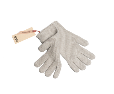 Light grey Mongolian cashmere knit gloves with a minimalist design, showcasing soft texture and sustainable craftsmanship.