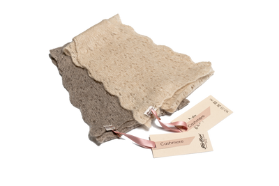 Beige lace cashmere scarf with scalloped edges and delicate openwork pattern, handcrafted from pure Mongolian cashmere for sustainable luxury.