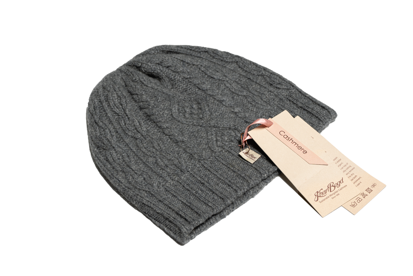 Dark gray Mongolian cashmere beanie with classic cable-knit texture, featuring soft ribbed edges and minimalist winter design.