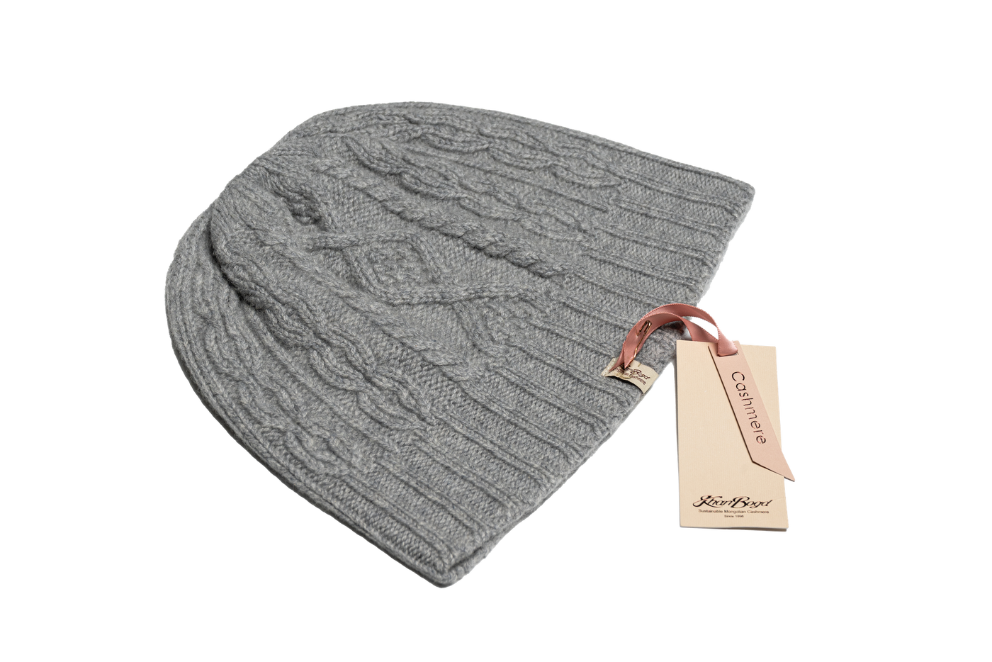 Gray Mongolian cashmere beanie with classic cable-knit texture and soft finish, showcasing minimalist design and sustainable craftsmanship.