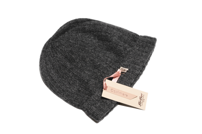 Dark gray Mongolian cashmere ribbed beanie with soft knit texture and designed for warmth, comfort, and refined winter style.