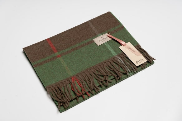 Green and brown check-pattern yak wool scarf with subtle red accents and fringe edges, made from 100% Mongolian yak wool for natural warmth and timeless style.