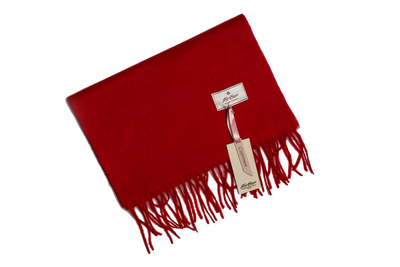 Red Mongolian cashmere scarf with fringe edges and soft texture, offering lightweight warmth and minimalist luxury design.