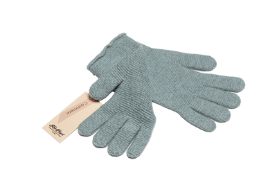 Dusty teal Mongolian cashmere knit gloves with a minimalist design, showcasing soft texture and sustainable craftsmanship.