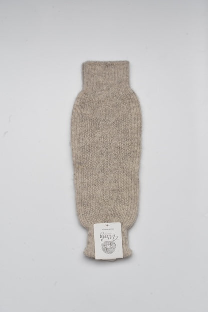 “beige 100% Mongolian sheep wool knee warmer with soft ribbed knit texture, natural warmth and comfort support accessory”