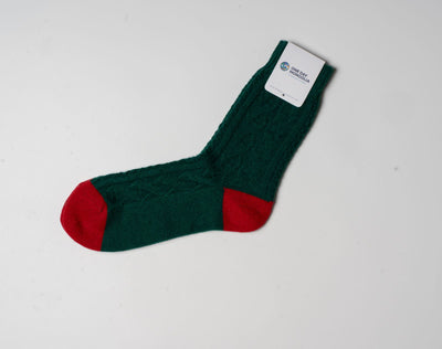 “Green and Red wool blend Christmas sock made with 60% Mongolian sheep wool, ribbed texture, eco-friendly winter wear.”