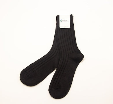 “Dark brown Mongolian wool blend socks with ribbed knit texture, 60% wool for warmth and comfort”