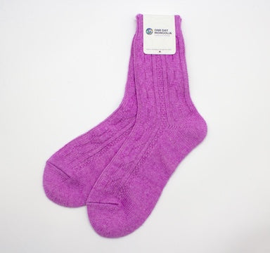 “Dark pink Mongolian wool blend socks with ribbed knit pattern, 60% wool for natural warmth and breathable comfort”