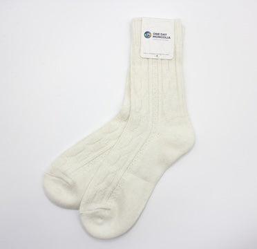 “White Mongolian wool blend socks with ribbed knit pattern, 60% wool for natural warmth and breathable comfort”