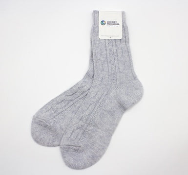 “Light grey Mongolian wool blend socks with ribbed knit pattern, 60% wool for natural warmth and breathable comfort”