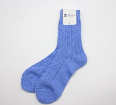 “Sky blue Mongolian wool blend socks with ribbed knit pattern, 60% wool for natural warmth and breathable comfort”
