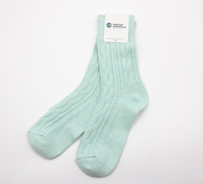 “Menthol blue Mongolian wool blend socks with ribbed knit pattern, 60% wool for natural warmth and breathable comfort”