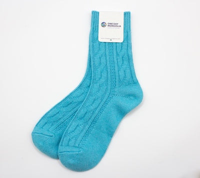 “Electric blue Mongolian wool blend socks with ribbed knit pattern, 60% wool for natural warmth and breathable comfort”