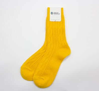 “Yellow Mongolian wool blend socks with ribbed knit pattern, 60% wool for natural warmth and breathable comfort”