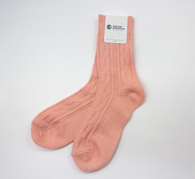 “Peach pink Mongolian wool blend socks with ribbed knit pattern, 60% wool for natural warmth and breathable comfort”