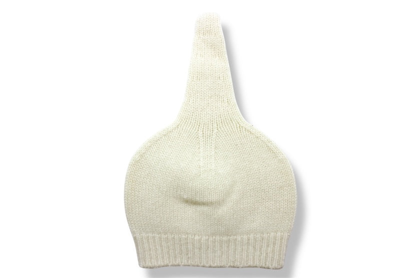 “Soft white Mongolian cashmere baby hat with natural knit texture, lightweight and hypoallergenic”
