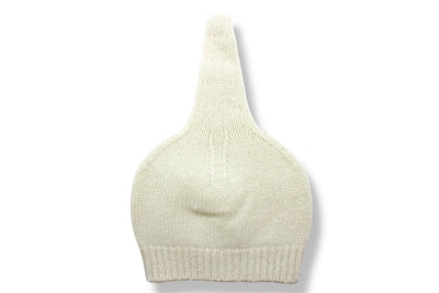 “Soft white Mongolian cashmere baby hat with natural knit texture, lightweight and hypoallergenic”