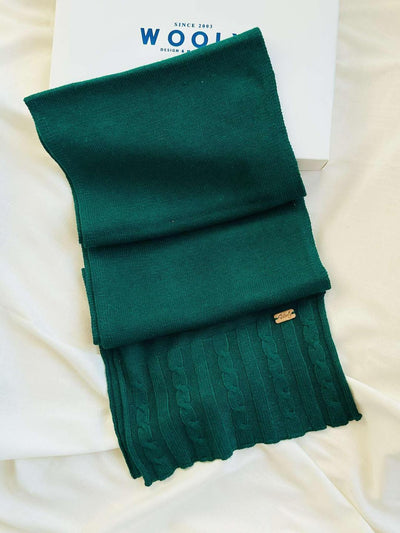 “Deep green Mongolian wool blend scarf with ribbed knit and cable pattern, 60% sheep wool for soft, breathable warmth”